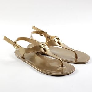 Michael Kors Mira lock logo gold jelly sandals